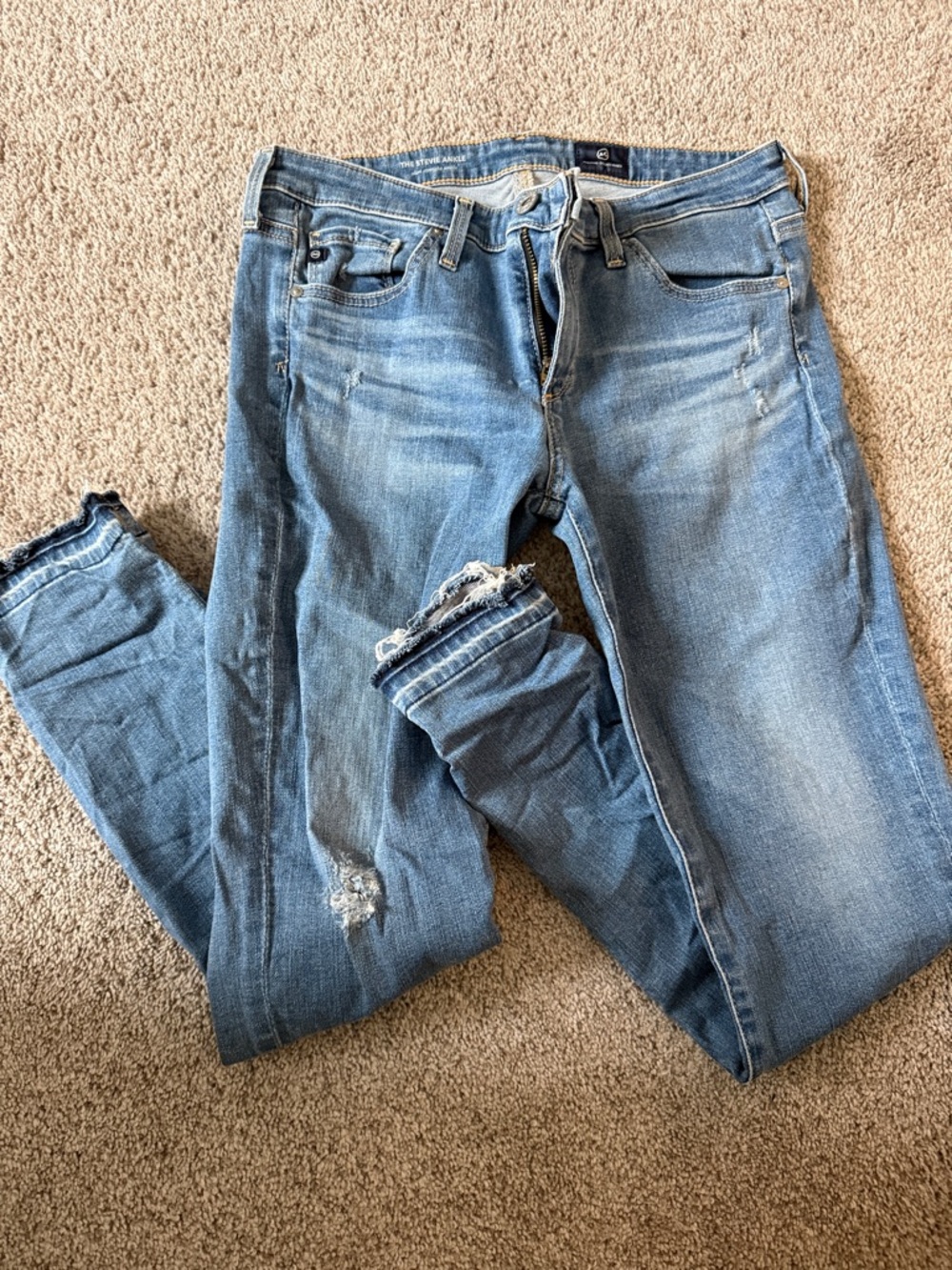 AG Adriano Goldschmied Light Blue Skinny Jeans with Distress